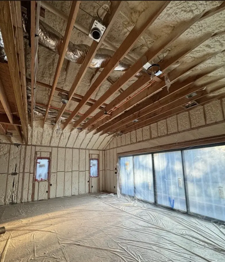 Interior walls and ceiling insulated with spray foam during new construction in Lacy-Lakeview